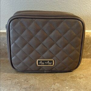 Itzy Ritzy Quilted Brown diaper bag comes with shoulder strap